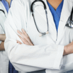 A group of doctors or healthcare professionals with stethoscopes around their necks.
